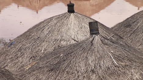 Panup-shot-of-a-Ugandan-village-in-Africa-with-thatched-roofs
